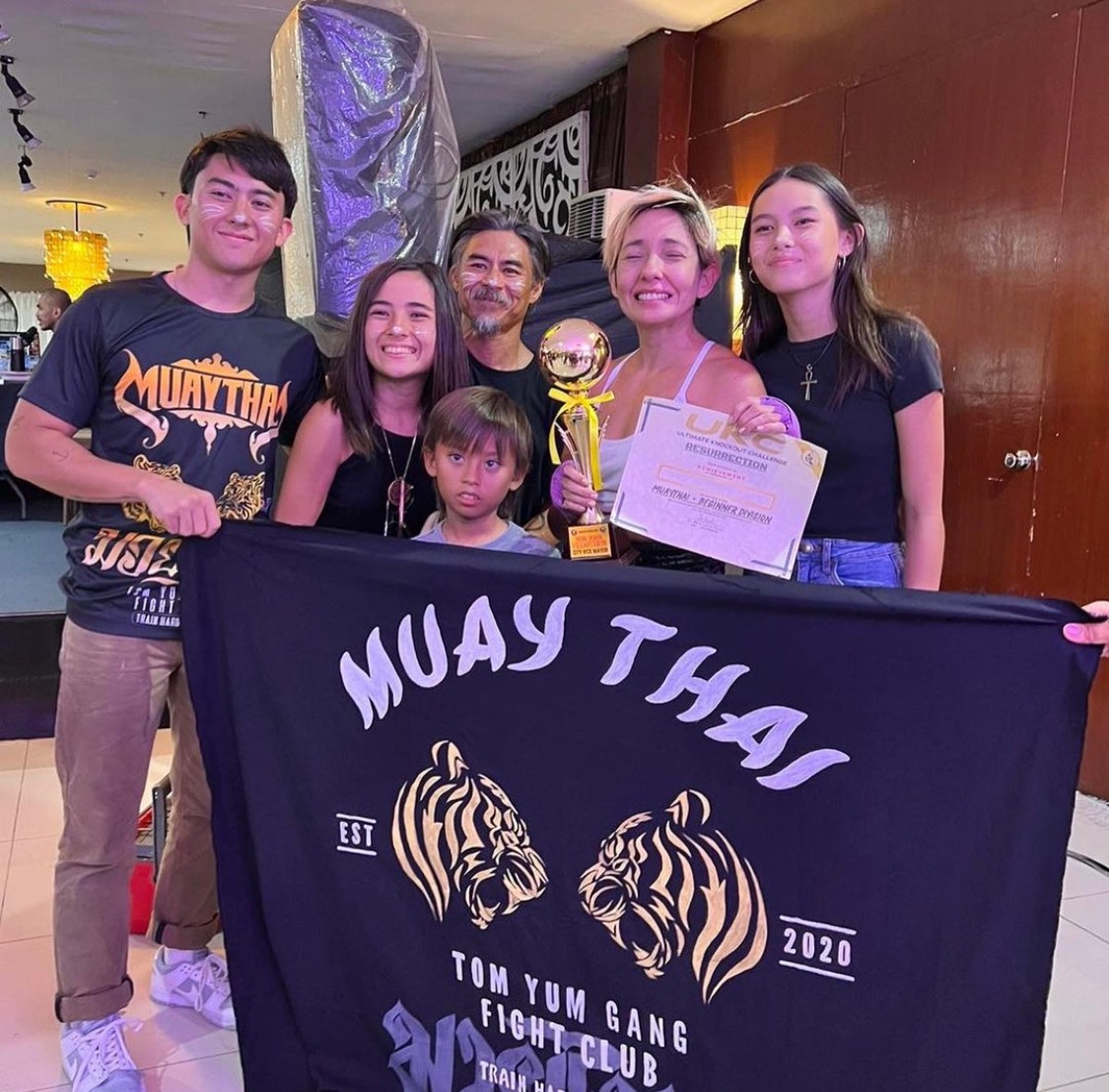 Hindy Weber after her Muay Thai fight. Here she is celebrating her huge win with her family.