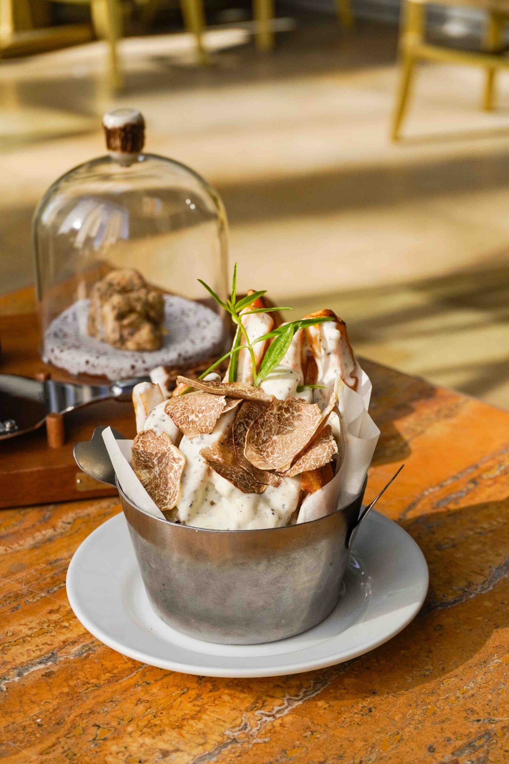 Tartufo Bianco on Luxe Fries with Truffle Mushroom Cream