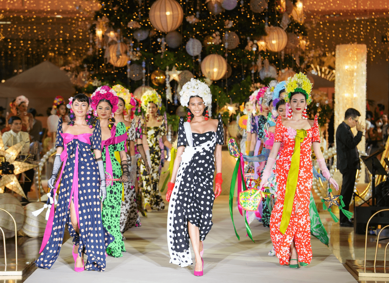 Michelle Dee (center) and Ara Arida (left) grace the runway for renowned fashion designer Lesley Mobo