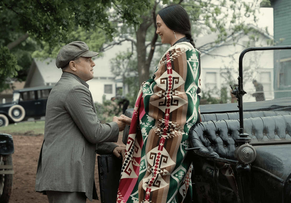 Ernest Burkhart (played by Leonardo di Caprio) and Molly Kyle Burkhart (played by Molly Gladstone)