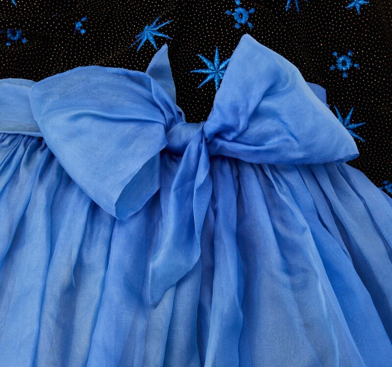 Designer Jacques Azagury designed the dress with a ballerina skirt as a nod to Princess Diana's love of dance