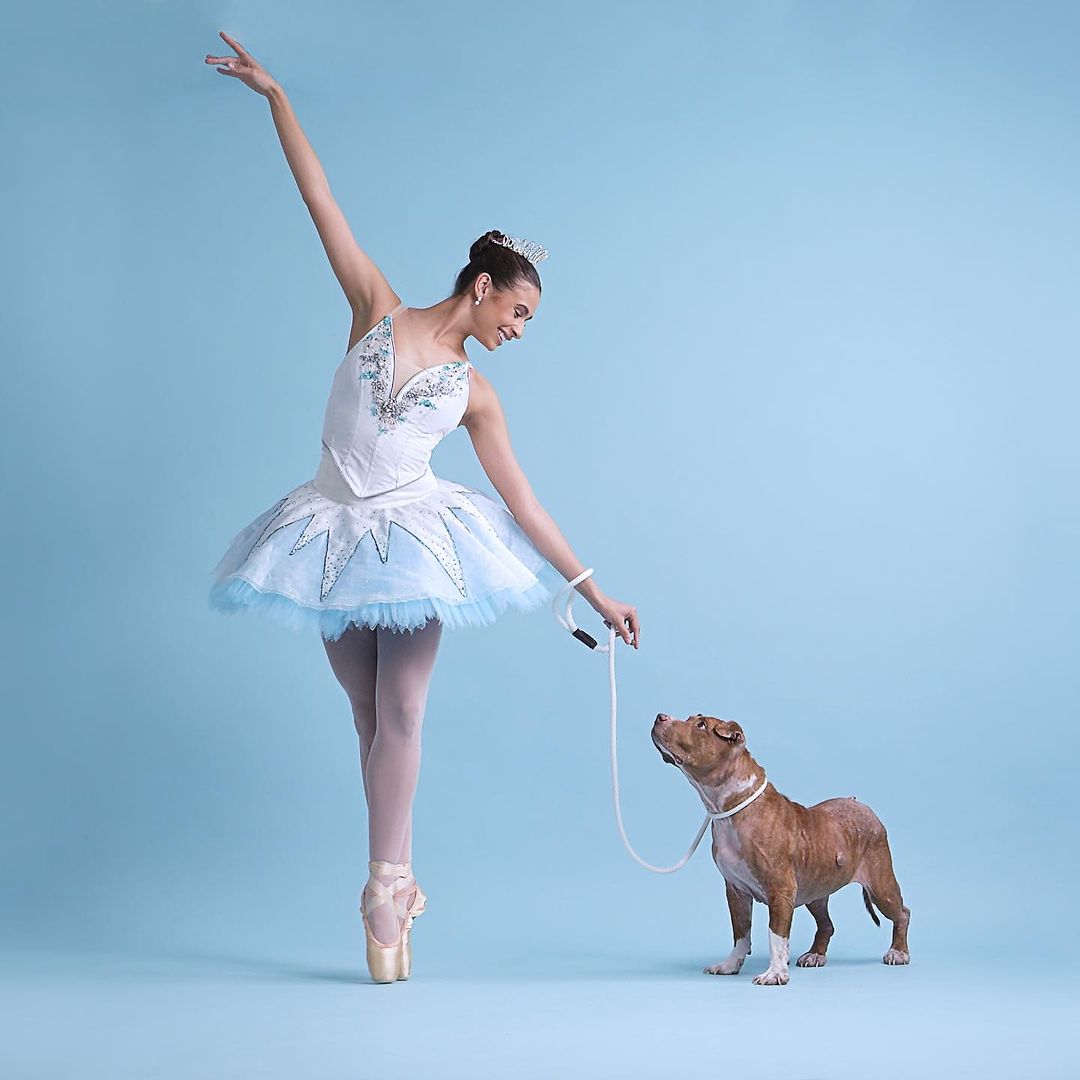 Zoe Middleton of Saint Louis Ballet as the Snow Queen, alongside 10-year-old stray, Scritches