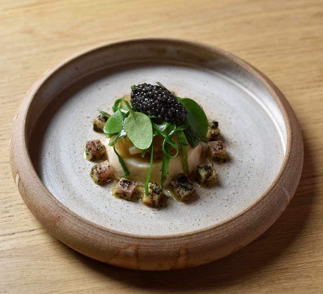 Seaweed custard, Severn & Wye smoked eel, seaweed dressing, shiitake pickled kohlrabi, Exmoor Caviar, and estuary greens