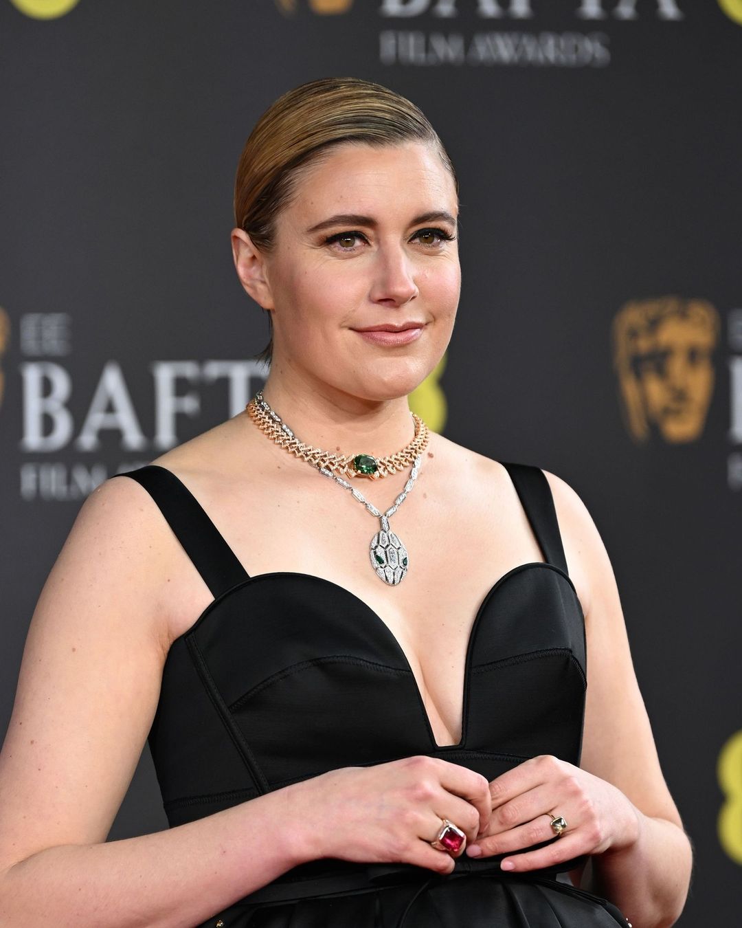 Greta Gerwig graced the red carpet with her Erdem gown and necklaces from Bulgari
