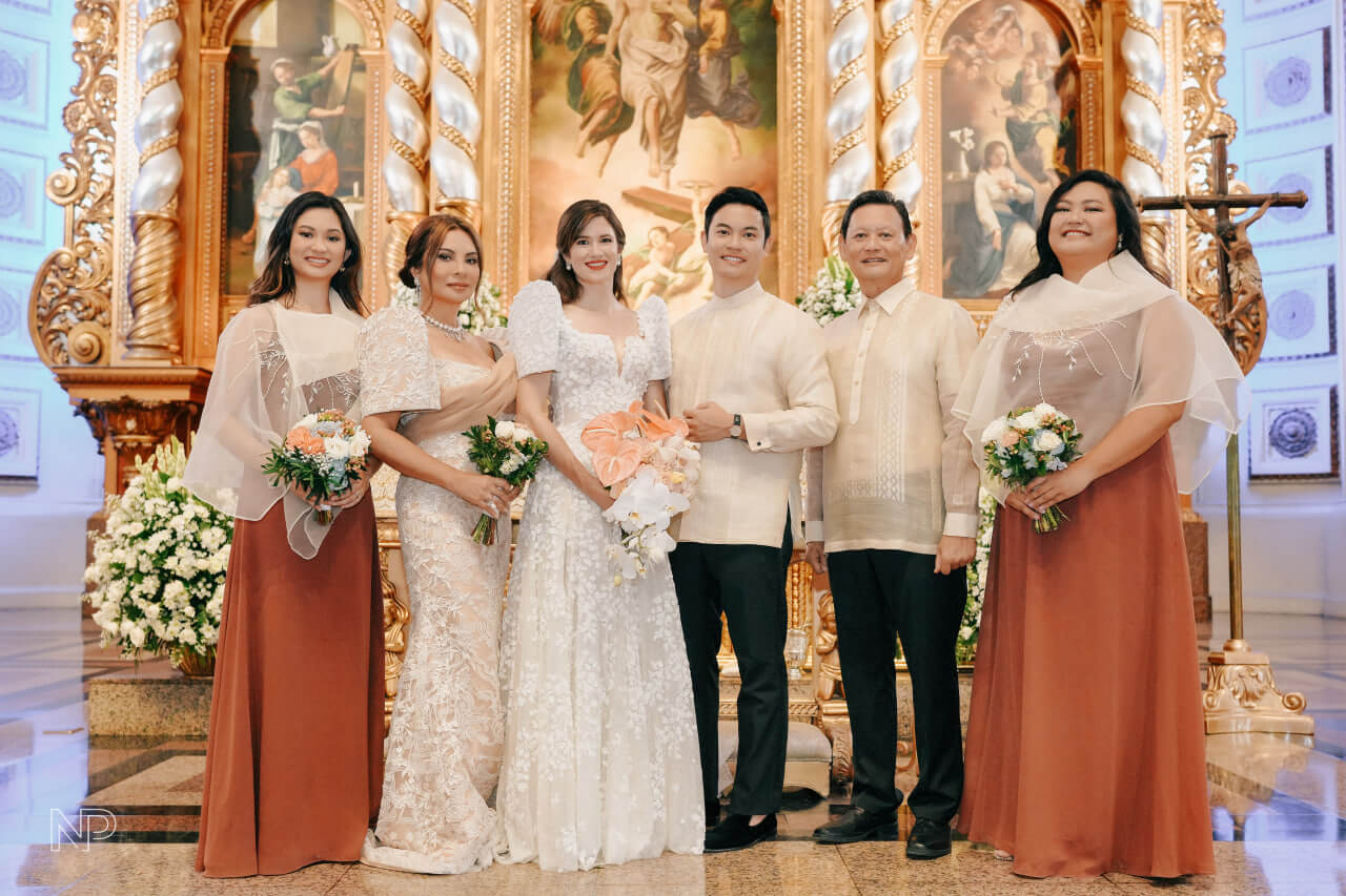 The happily-wedded couple with the groom's side of the family