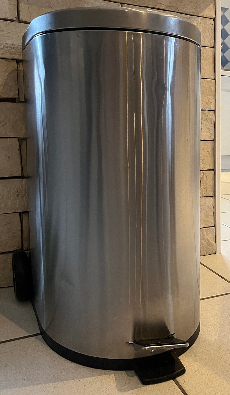 A foot pedal trash can