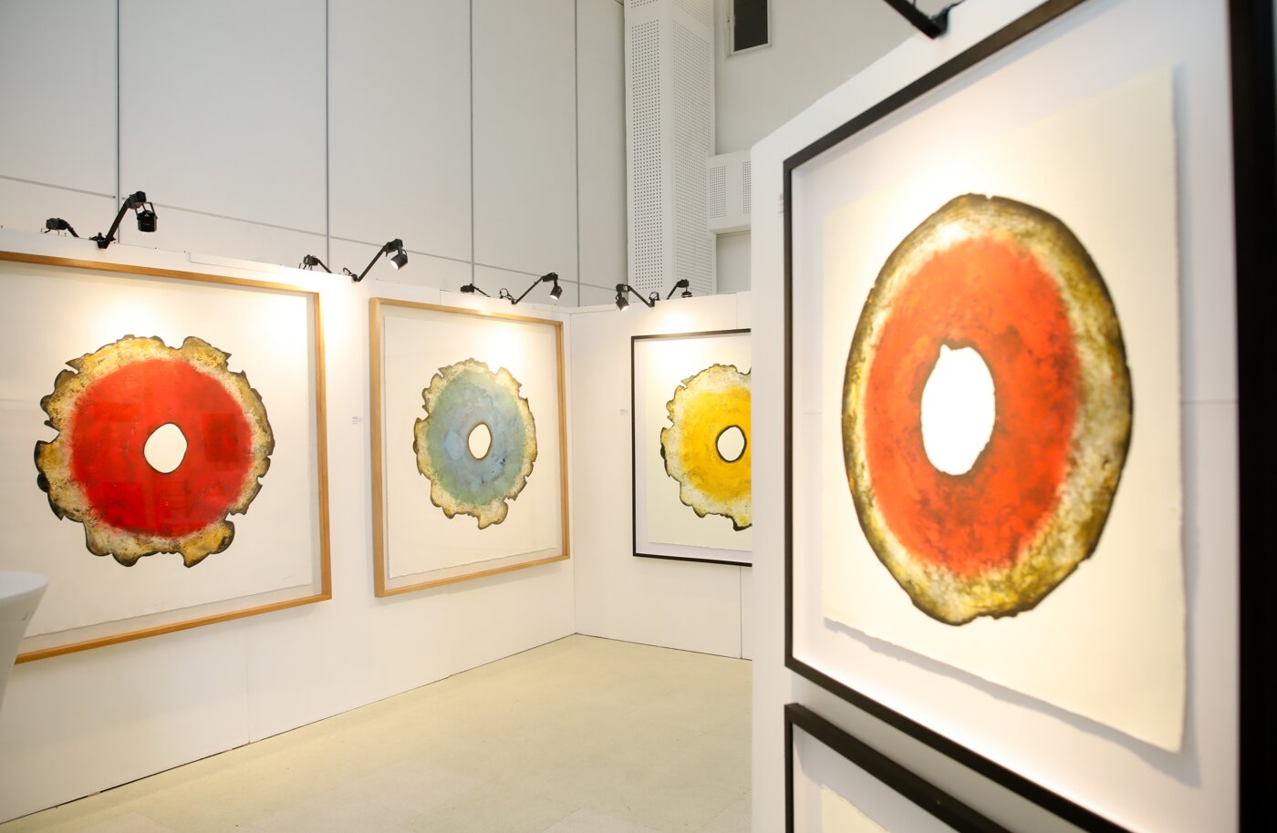 Circular "Archipelago Flower" and "Rune Talisman" works showcasing Godin's special printmaking technique