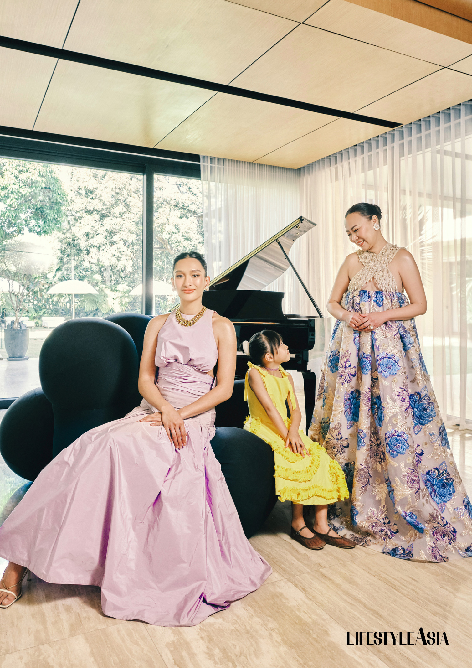 ON BEA: Lilac silk tafetta dress, ANTHONY RAMIREZ; Turbo shell earrings, necklace and bracelet, RIQUEZA; ON BILLIE: Lemon yellow dress, RAJITO; ON BENG: Lilac floral printed gown with pearl embellishments, PAUL CABRAL; Flower shell earrings, RIQUEZA