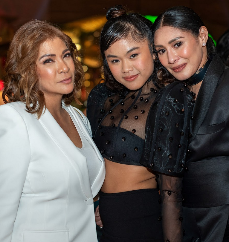 Abigail Adriano flanks Miss Saigon alumnae Pinky Amador and Carla Laforteza