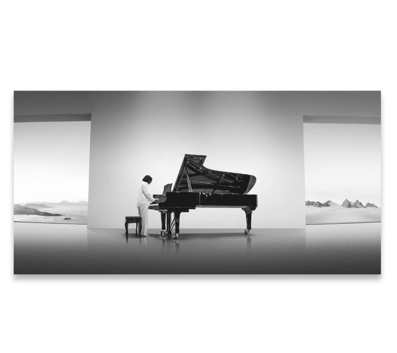 Marc Aran Reyes. His pieces primarily use a minimalist palette of white, grey, and black, and employ classical techniques like layering and chiaroscuro.