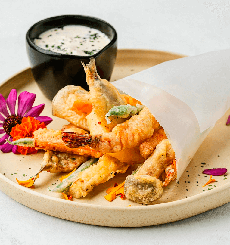 TOP LEFT: 24-hour Sous-Vide Crispy Pork Pata On Macadamia Kare-Kare; TOP RIGHT: Vuco Fye ; BOTTOM LEFT: Fritto Misto Battered Prawns, Tawilis and Vegetables with Calamansi Aioli ; BOTTOM RIGHT: Chilean Mussels Green Curry and Coconut