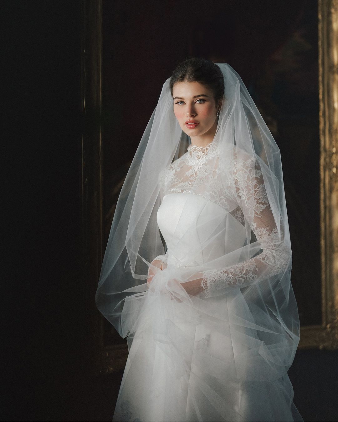 This gown has a Bowman Topper with a scalloped neckline and cuff