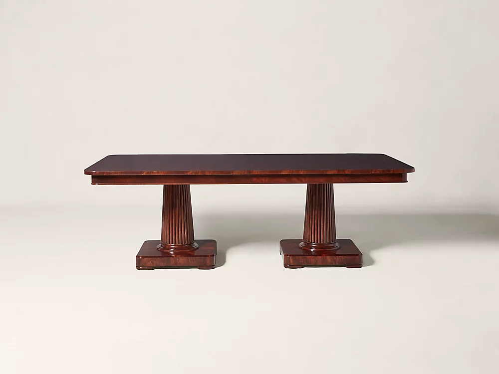 LEFT: Linens from Ralph Lauren Home’s “Harlow Bedding” collection; RIGHT: Ralph Lauren Home’s Mayfair Pedestal Extendable Dining Table