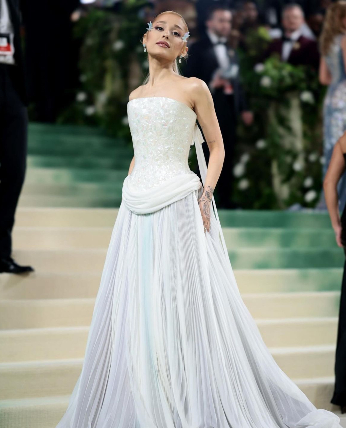 Ariana Grande looked stunning in a pearly white gown at the 2024 Met Gala.
