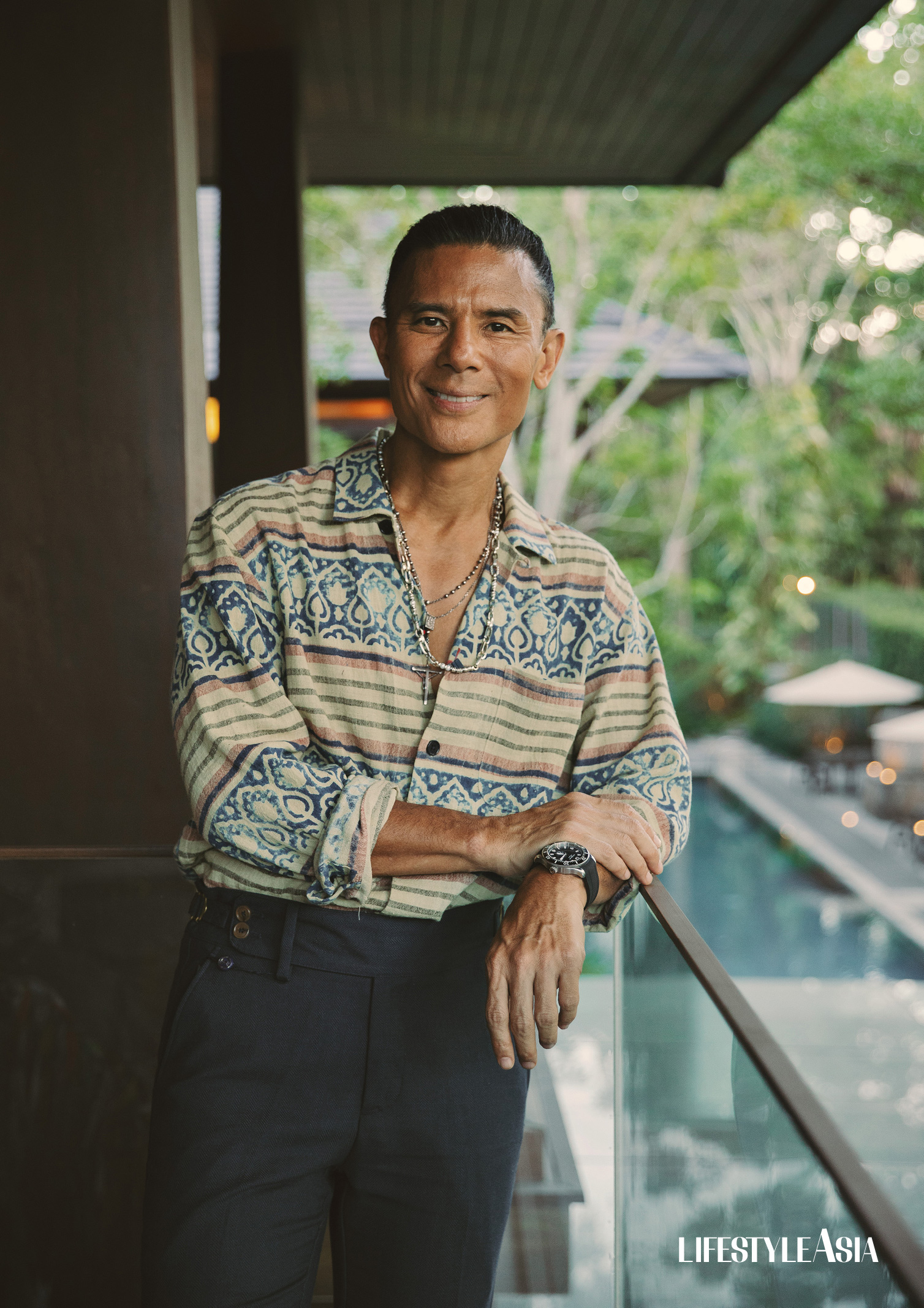 Block print shirt, KARDO; Navy wool trousers, BENJAMIN BARKER; Silver necklace, JOHN HARDY; Brown laceup shoes, KLEMAN; All available at RUSTAN’S Makati