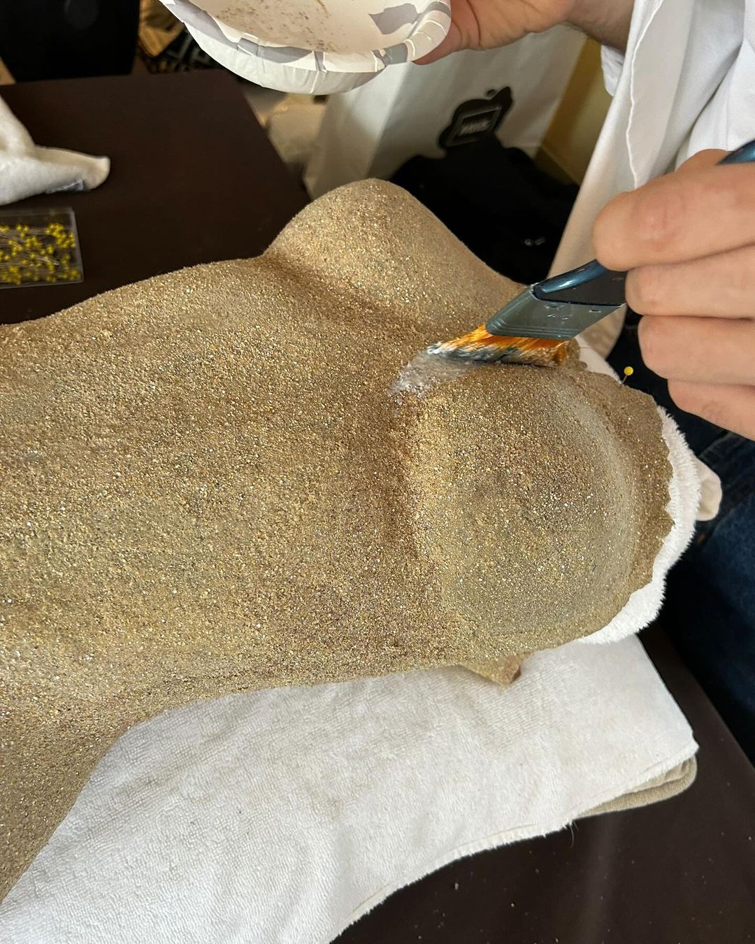 Creation of Balmain's sand dress, worn by Tyla at the Met Gala