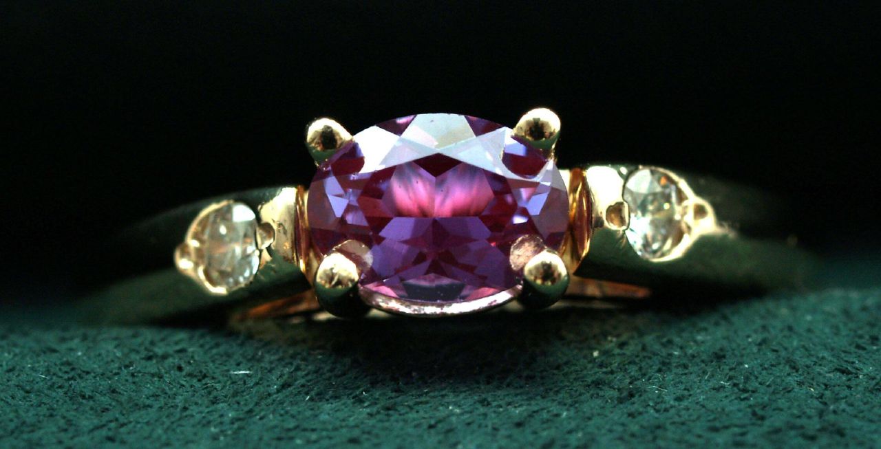 An alexandrite ring with hues of red and purple