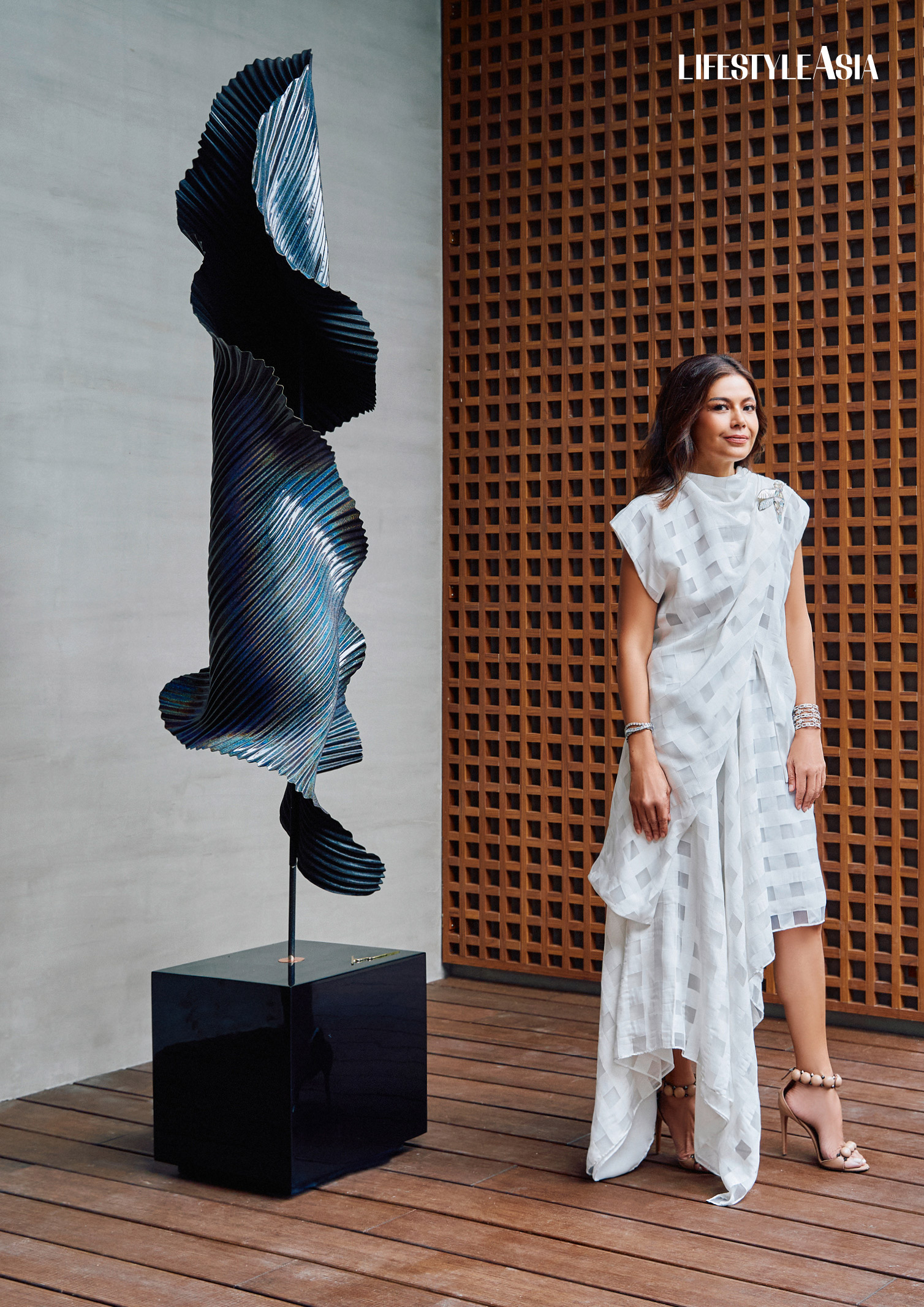 Oversized gingham print asymmetric set, ROBERT VILLAR; Bird brooch and cuff, JUL B. DIZON.