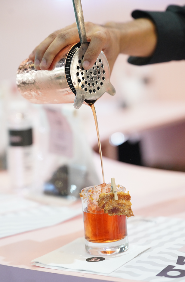 LEFT: The VIP tasting menu for Baken's multi-sensory experience; RIGHT: Pouring a shot of Bacon in a Glass