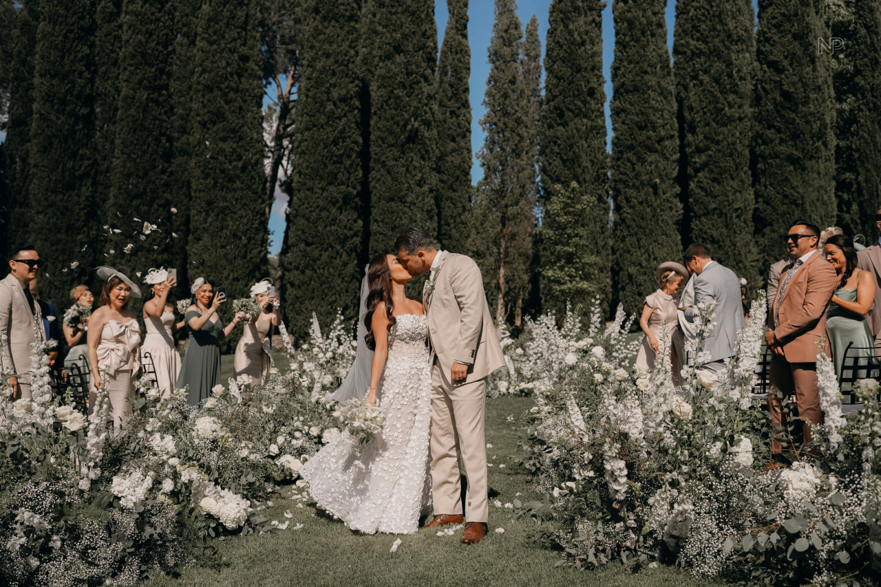 Karla and Oliver seal their commitment with a kiss after the wedding rites