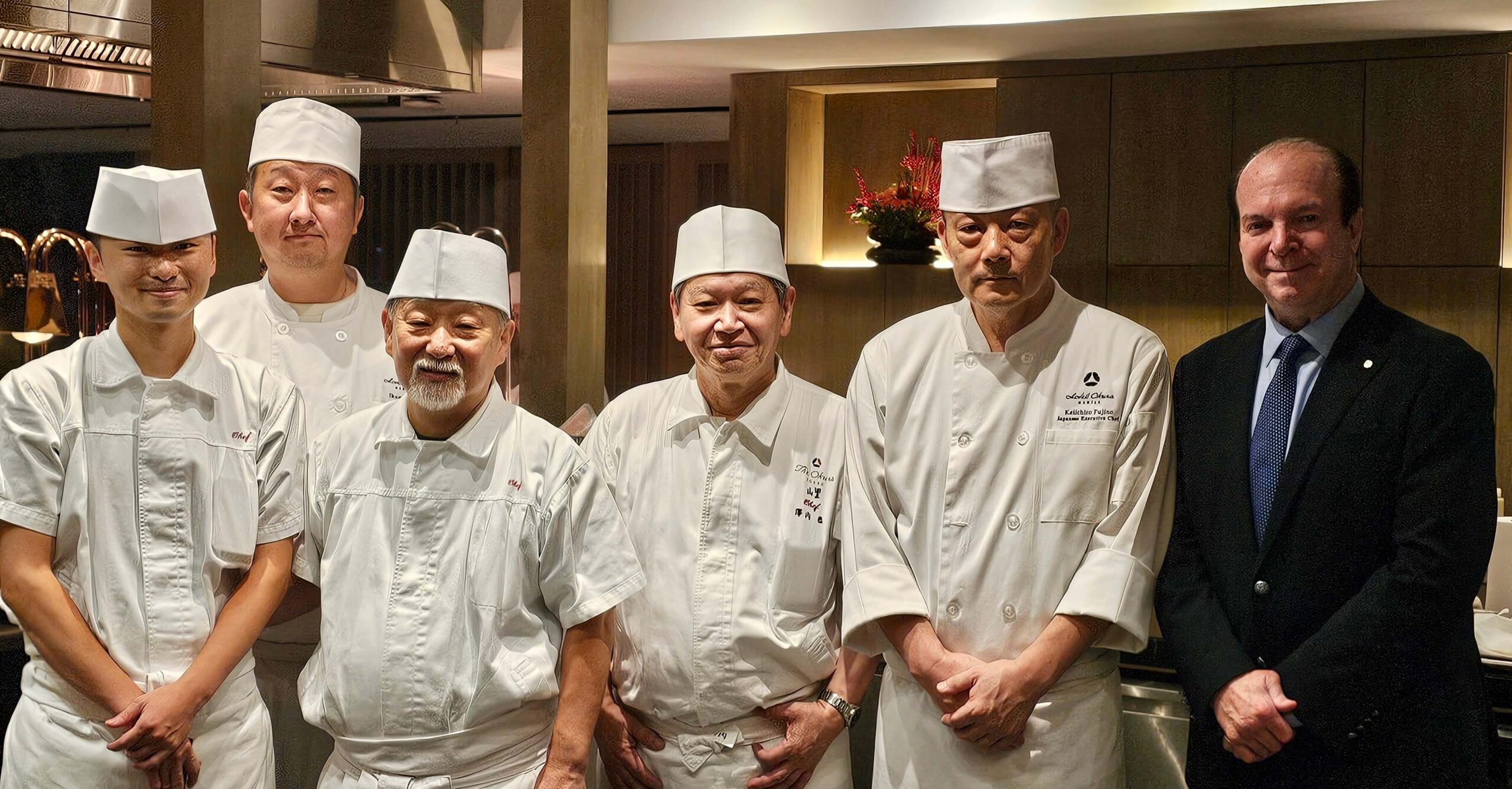 L-R: Chef Jumpei Yamanashi (from Yamazato in The Okura Tokyo); Chef Ikuma Sato (Sushi specialty Chef in Hotel Okura Manila); Tempura Specialty Chef and founder of former Karasawa Tempura, Chef Takashi Karasawa; Grand Chef of Japanese Fine Dining of Hotel Okura Group, Tadashi Sawauchi; Japanese Executive Chef, Hotel Okura Manila Keiichiro Fujino; General Manager of Okura Manila, Jan Marshall