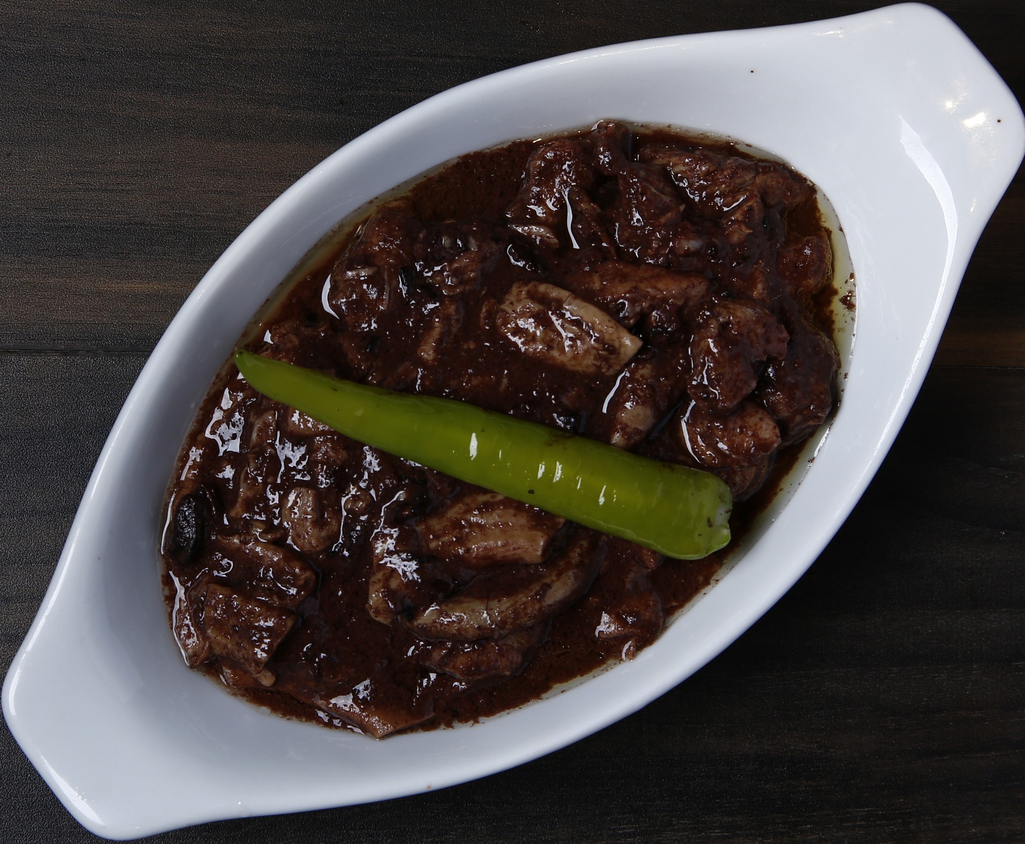 TOP LEFT: Balo Balo. TOP RIGHT: Arobung Kamaru. BOTTOM LEFT: Spicy Sisig Pampanga. BOTTOM RIGHT: Tidtad.