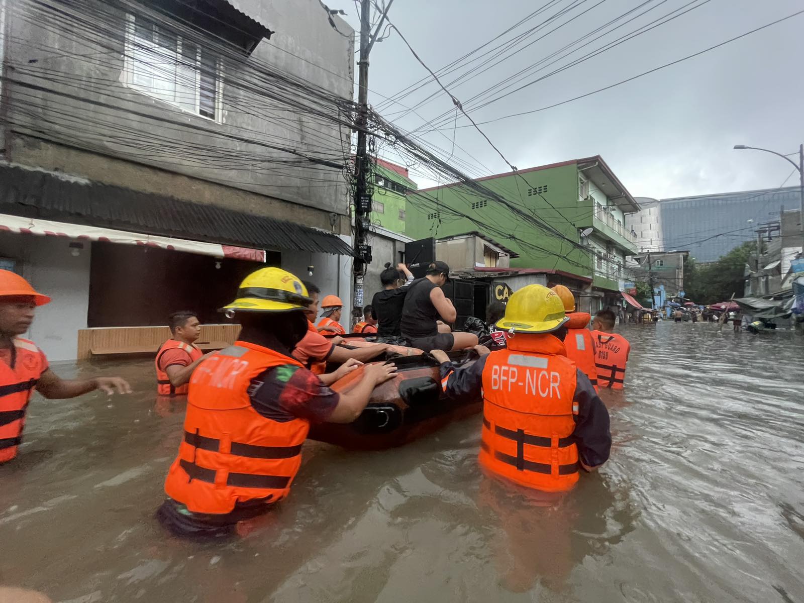 Members of the Philippine Coastguard in a rescue mission amid typhoon Carina