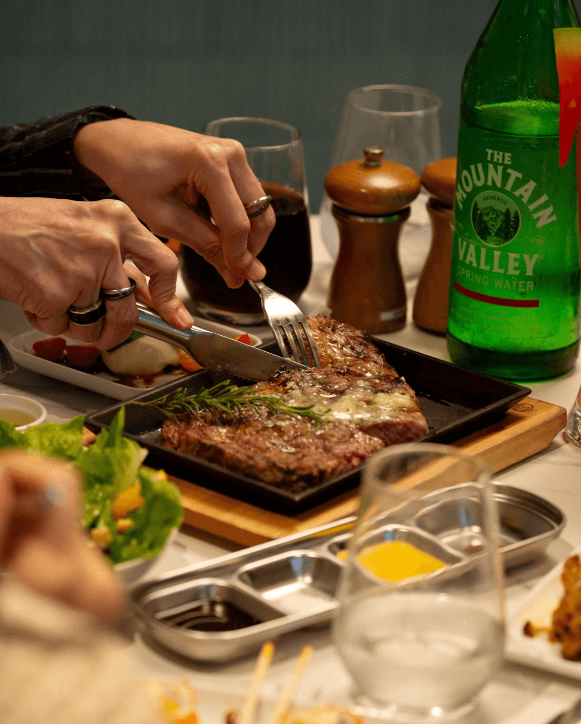 LEFT: The Sommelier at Joel's Place offers local and imported spirits. RIGHT: Ready-to-eat steaks by Joel's Place.
