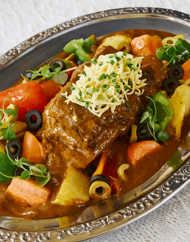TOP LEFT: Fresh Salad with Buratta, Figs, and Prosciutto. TOP RIGHT: Grilled Chicken. BOTTOM LEFT: Dessert Tower Merienda. BOTTOM RIGHT: Caldereta.