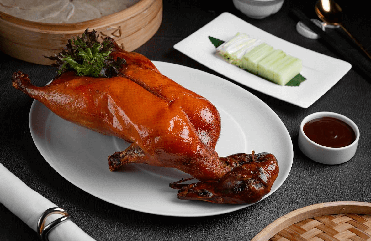 TOP LEFT: Poached Hokkaido Scallop in Sour Broth. TOP RIGHT: Braised Sea Treasures Broth. BOTTOM: Crystal Dragon’s Roasted Farm Peking Duck.