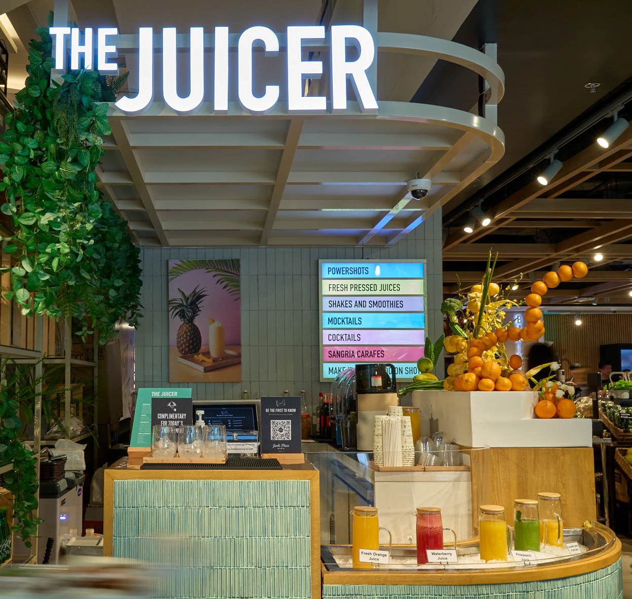 Inside Joel's Place in Glorietta. TOP LEFT: The Juicer counter; TOP RIGHT: The Fishmonger counter; BOTTOM: The Deli counter.