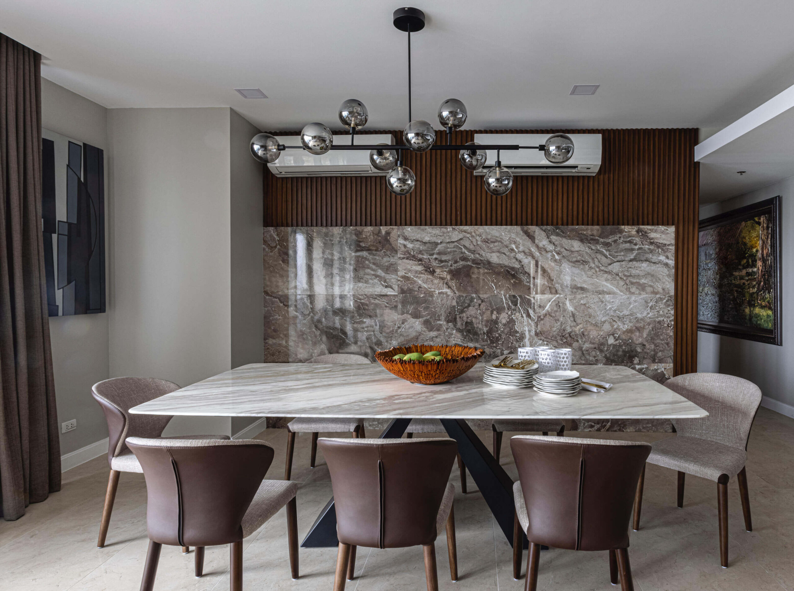 Mixing materials and textures to heighten the dining experience in this condominium unit in BGC/Photo by Jar Concengco