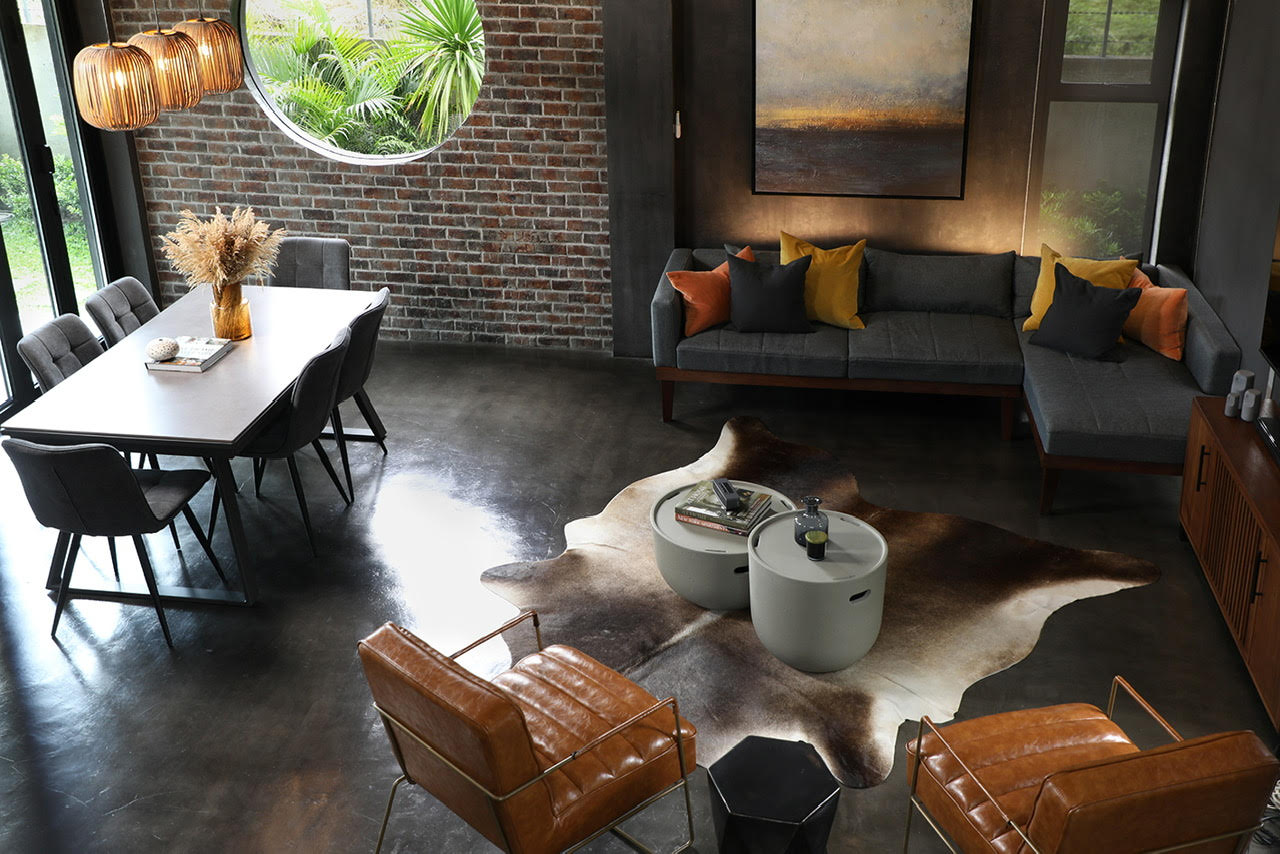 The design direction for this project was to create an industrial loft style space that the owners  of the villa can use as a weekend home/Photo by Arthur Tselishchev