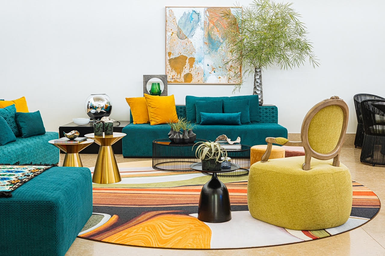 LEFT: This bridal suite at Hillcreek Gardens Tagaytay is a tranquil tropical oasis/Photo by Arthur Tselishchev. RIGHT: Complementing bright hues liven up this living room; inspiration for the mix of colors informed by the the MOOOI carpet/Photo by Paola Aseron