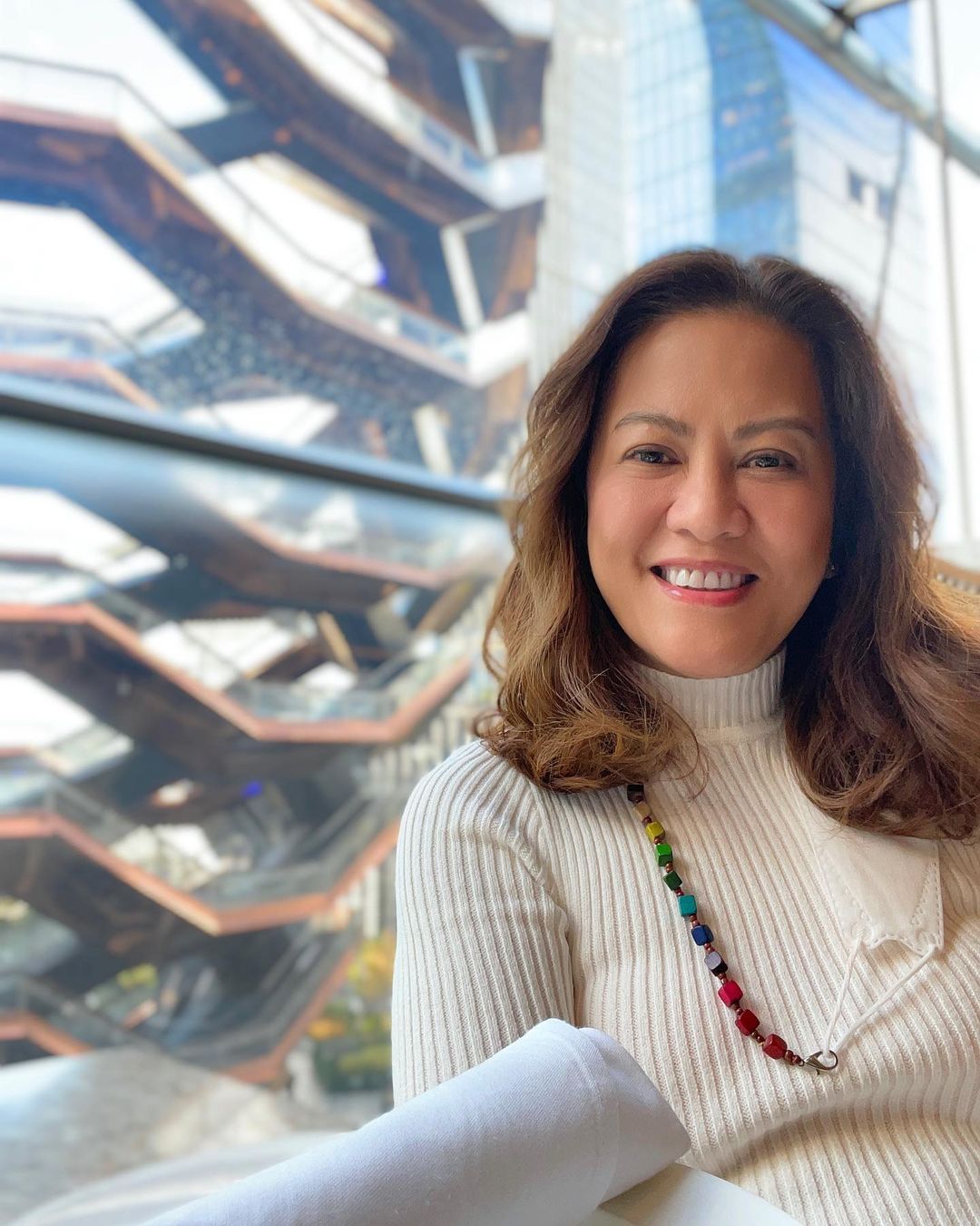 LEFT: Cherry Reyes. RIGHT: Reyes at work at the TONI&GUY WORLD show last July (Photo by Charles Villacruz)