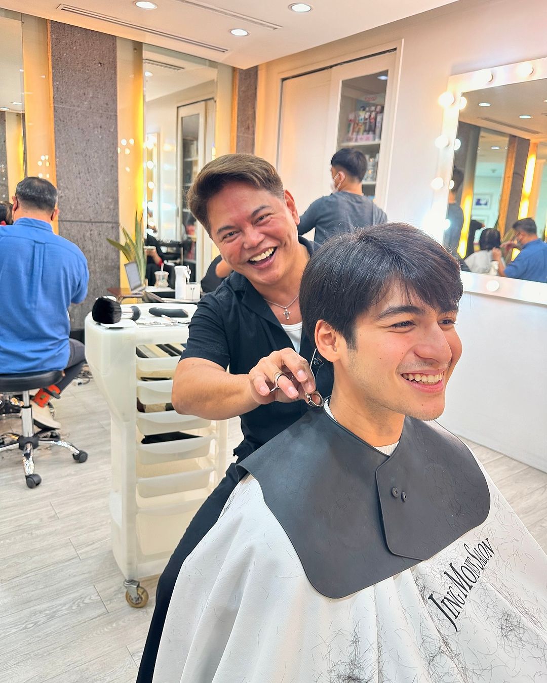 LEFT: Jing Monis. RIGHT: Jing Monis working on the hair of Andres Muhlach.