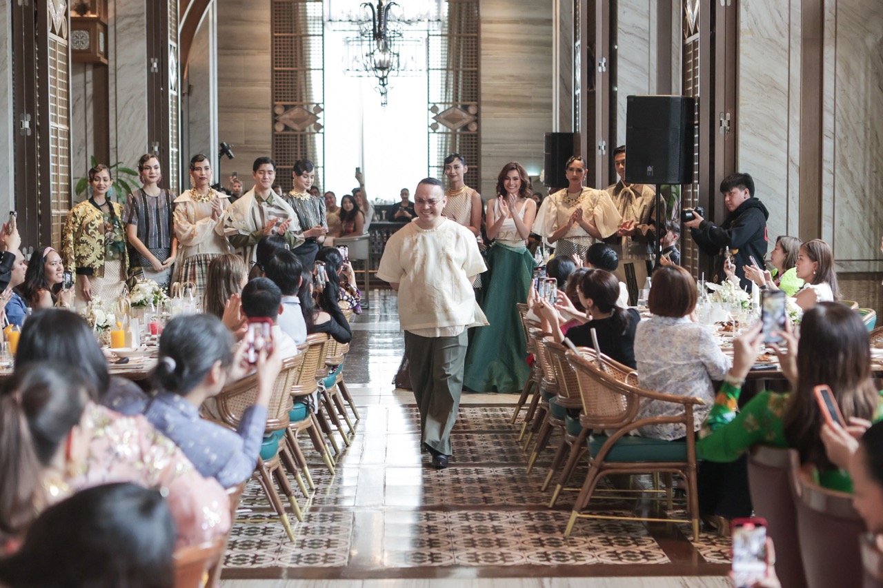 Jor-el Espina takes a bow after presenting Adaptation, a 14-piece collection