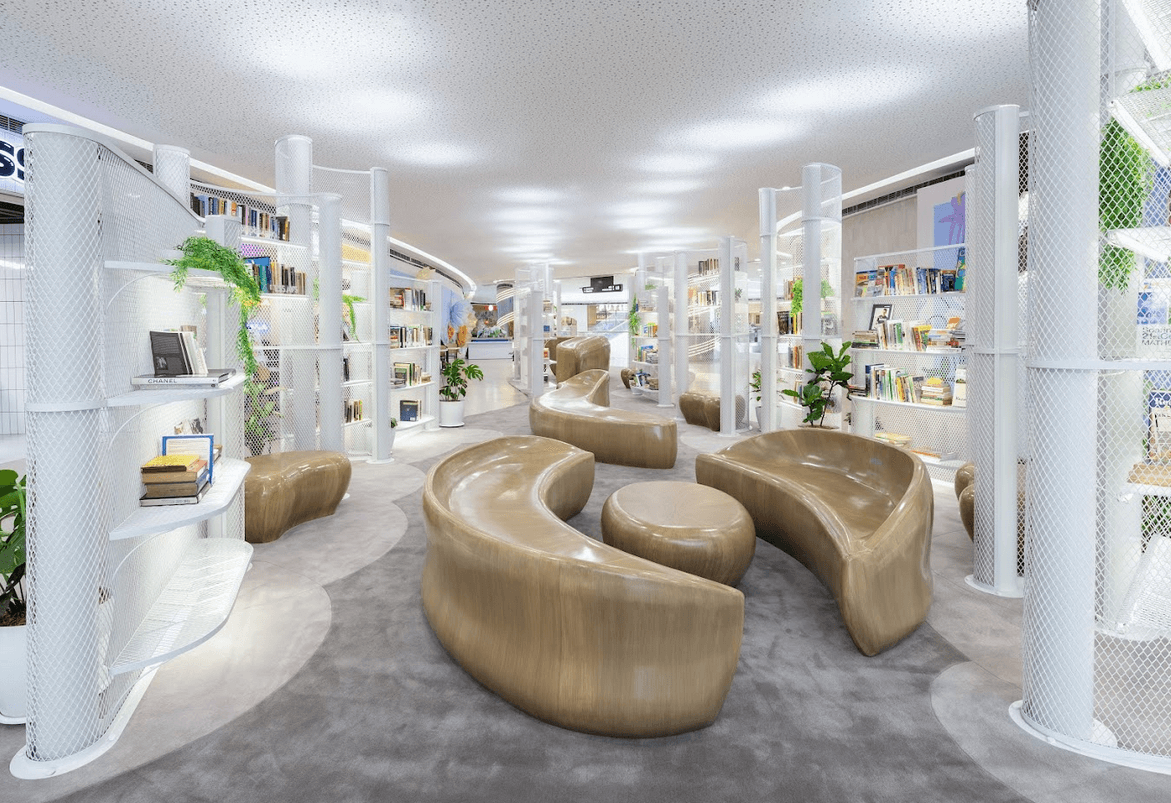 LEFT: The Book Nook's design is a seamless flow of organic forms and open spaces. RIGHT: Discover your next favorite read among the diverse book collection at the Book Nook.