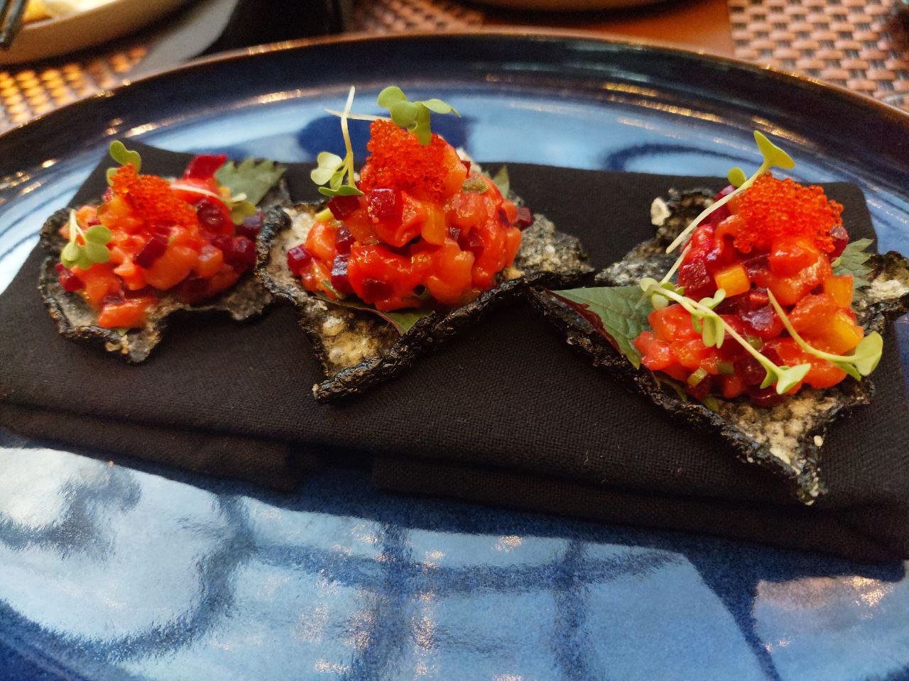 TOP LEFT: Prawn Toast. TOP RIGHT: Charred Cauliflower. BOTTOM LEFT: Grilled Eggplant & Whipped Feta-Tofu. BOTTOM RIGHT: Smoked Salmon Nori Chip.