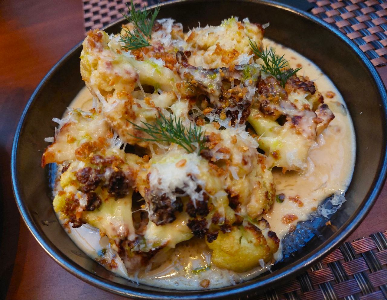 TOP LEFT: Prawn Toast. TOP RIGHT: Charred Cauliflower. BOTTOM LEFT: Grilled Eggplant & Whipped Feta-Tofu. BOTTOM RIGHT: Smoked Salmon Nori Chip.