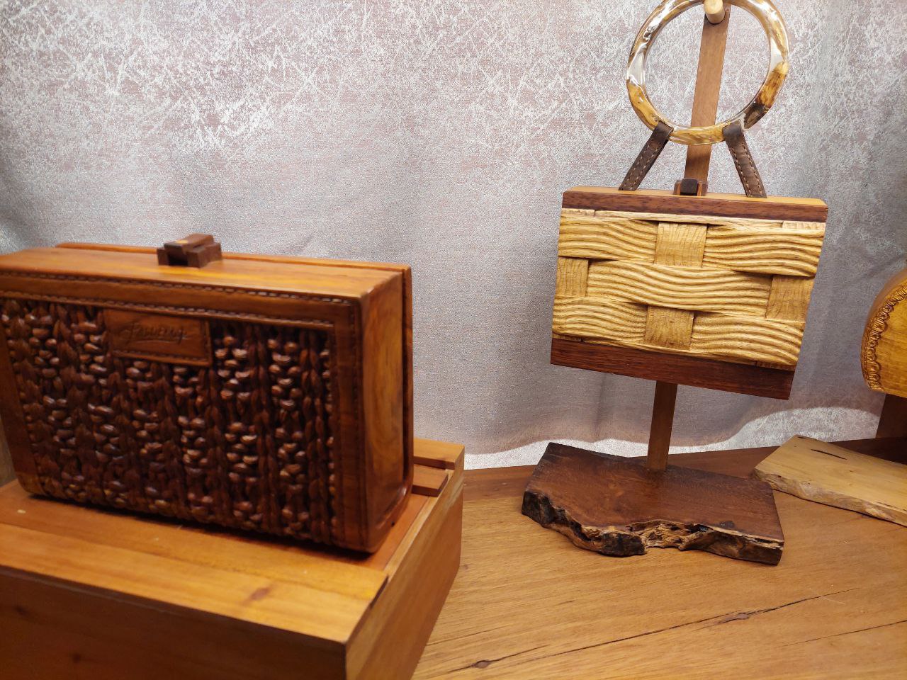 Intricate wooden sculptures by Charming Baldemor (top left and right), along with a Filipino nativity scene from the local artisans she works with