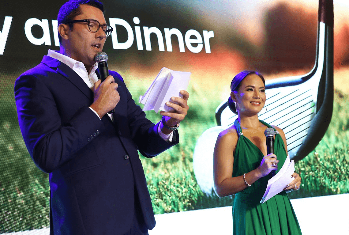 Hosts Dominic Uy and Aziza Mondobedo during the "Play It Forward" golf tournament fundraiser