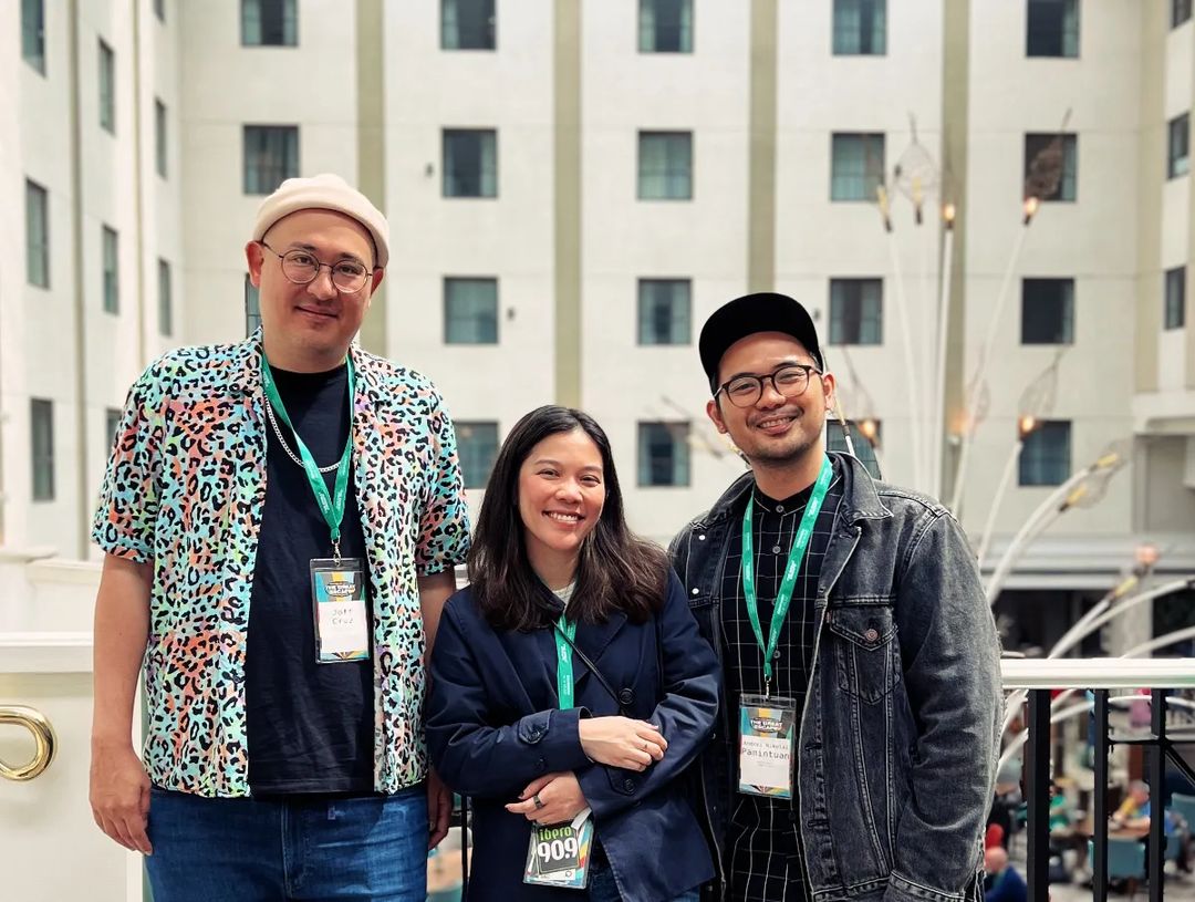 Philippine Filipino delegates Joff Cruz and Nicole Sarmienta, with Andrei Nikolai Pamintuan (head of Arts at the British Council in the Philippines)