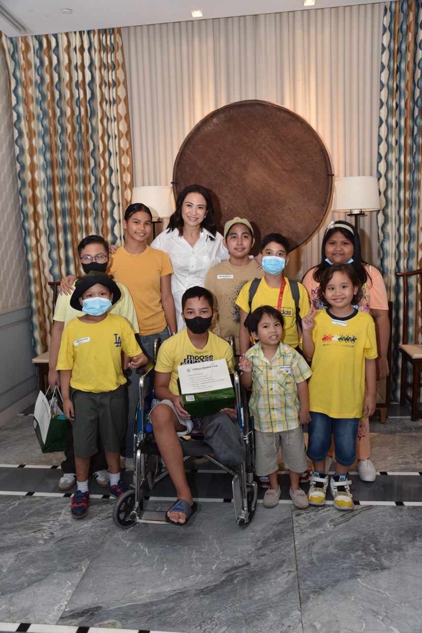 Sheila Romero with pediatric cancer survivors IWTS Foundation