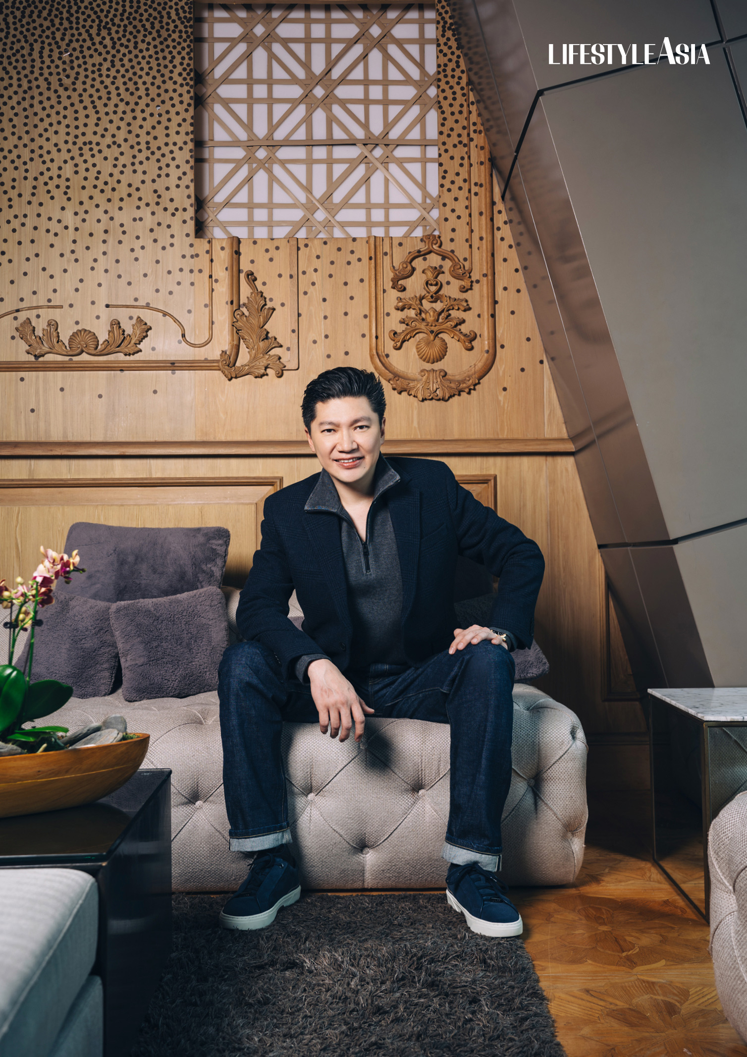 Gan's medical odyssey began with the support of his parents and mentors like Dr. Lucia Valderama and Dr. Peter K. Moy of UCLA (Jacket, sweater, and pants from BANANA REPUBLIC)