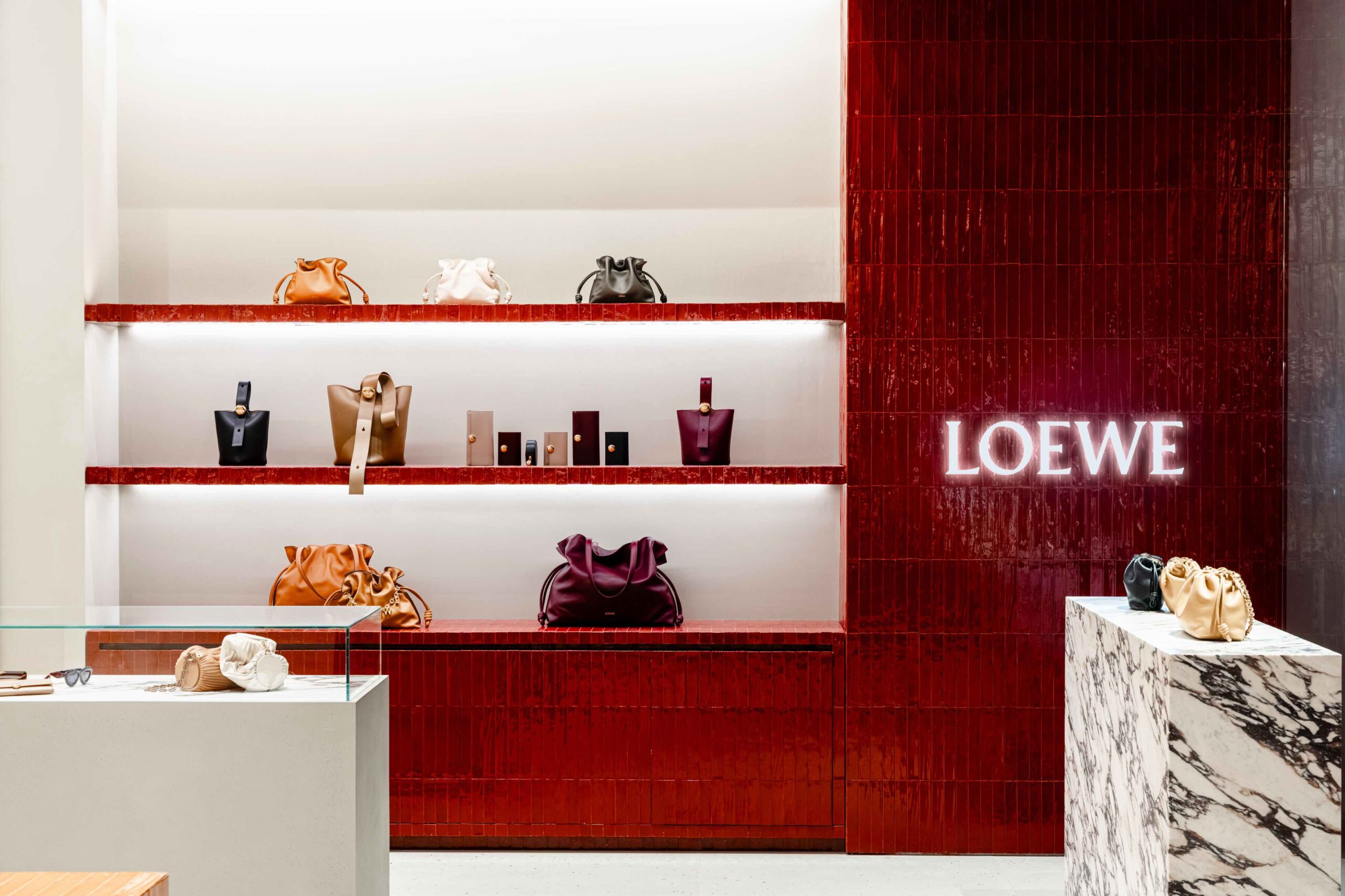 Loewe’s 144 square meter store features the CASA LOEWE concept, artistry with luxury through Spanish wool rugs, ceramic tiles, and bespoke furnishings