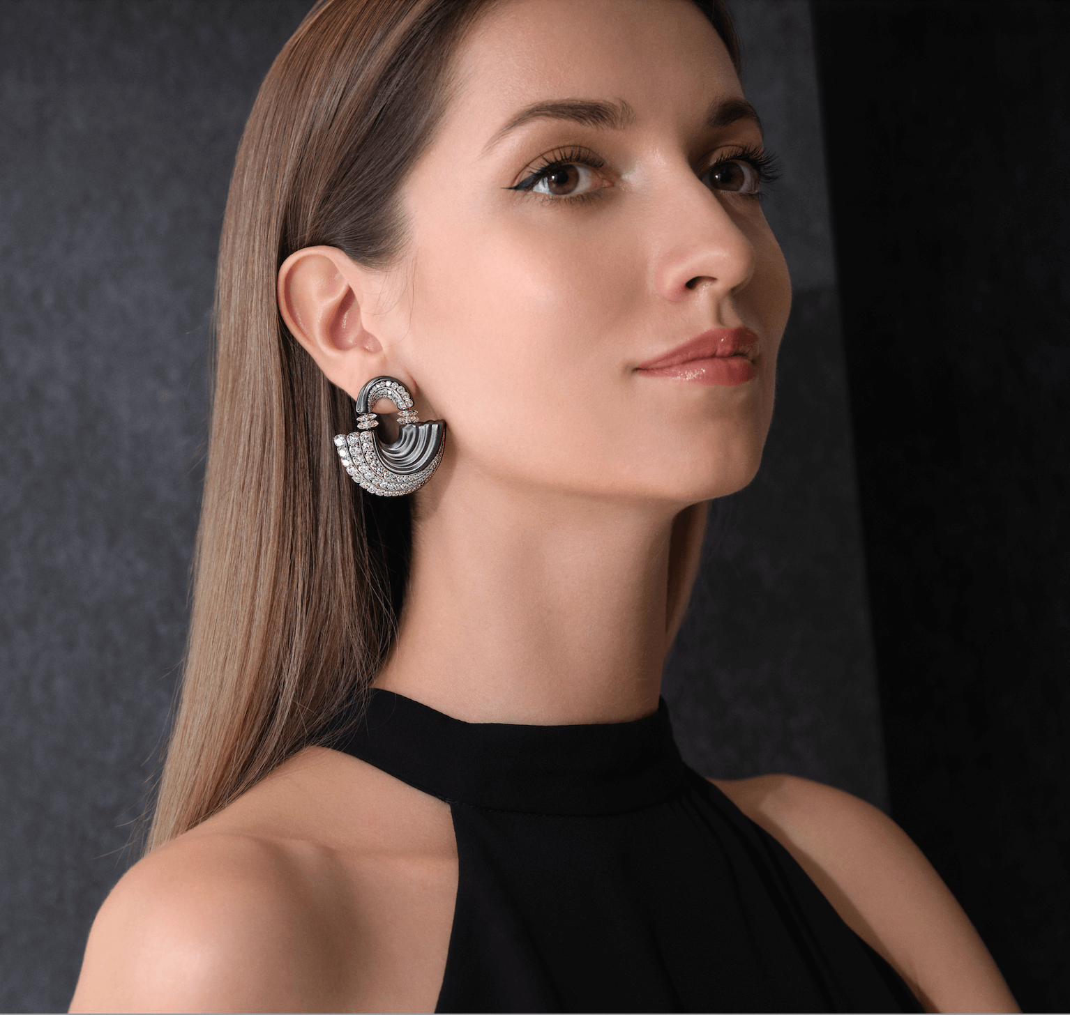 Model wearing tribal earrings from Forms Jewellery