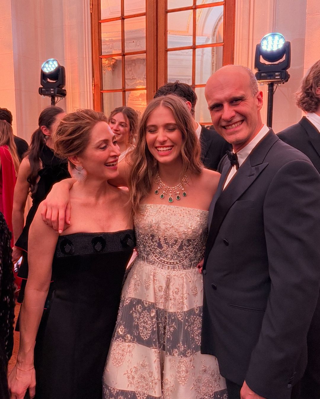 Lucia Ponti and her parents in Giorgio Armani