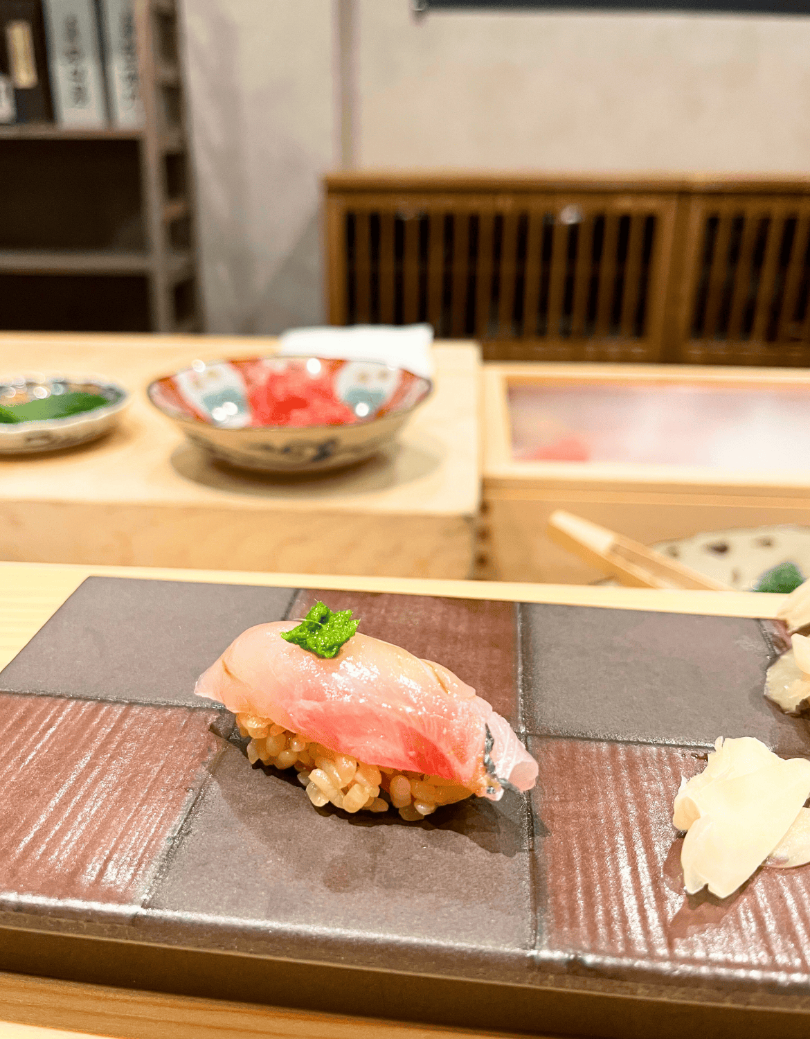 Mackerel nigiri over red vinegar rice in Fukui Japan