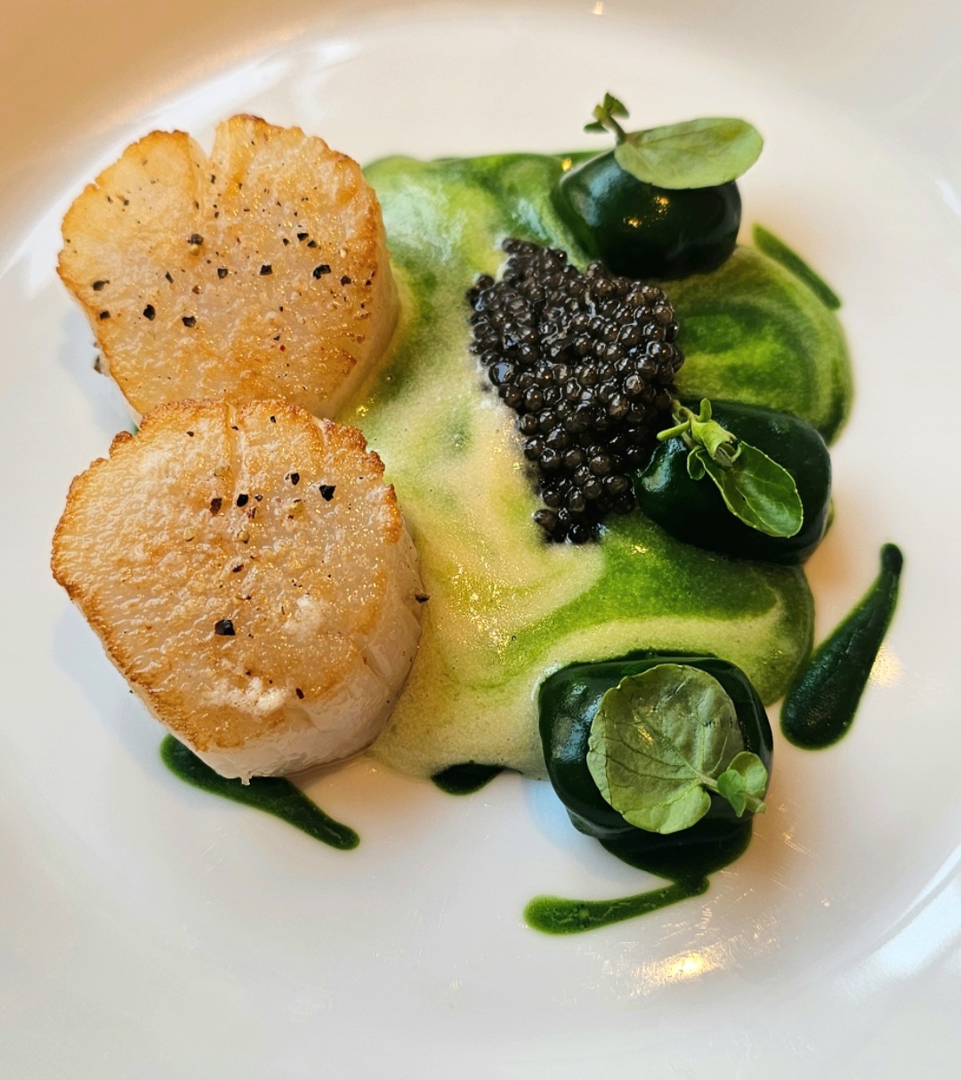 Sea scallops from Normandy, watercress gnocchi and caviar, creamy smoked potatoes; Crab from Brittany, buckwheat and salicornia, light coral mayonnaise; John Dory from Finistère, carrots from Touraine, and sea urchin from Galicia stock reduced with carrot and yellow wine/Photos by Pepper Teehankee